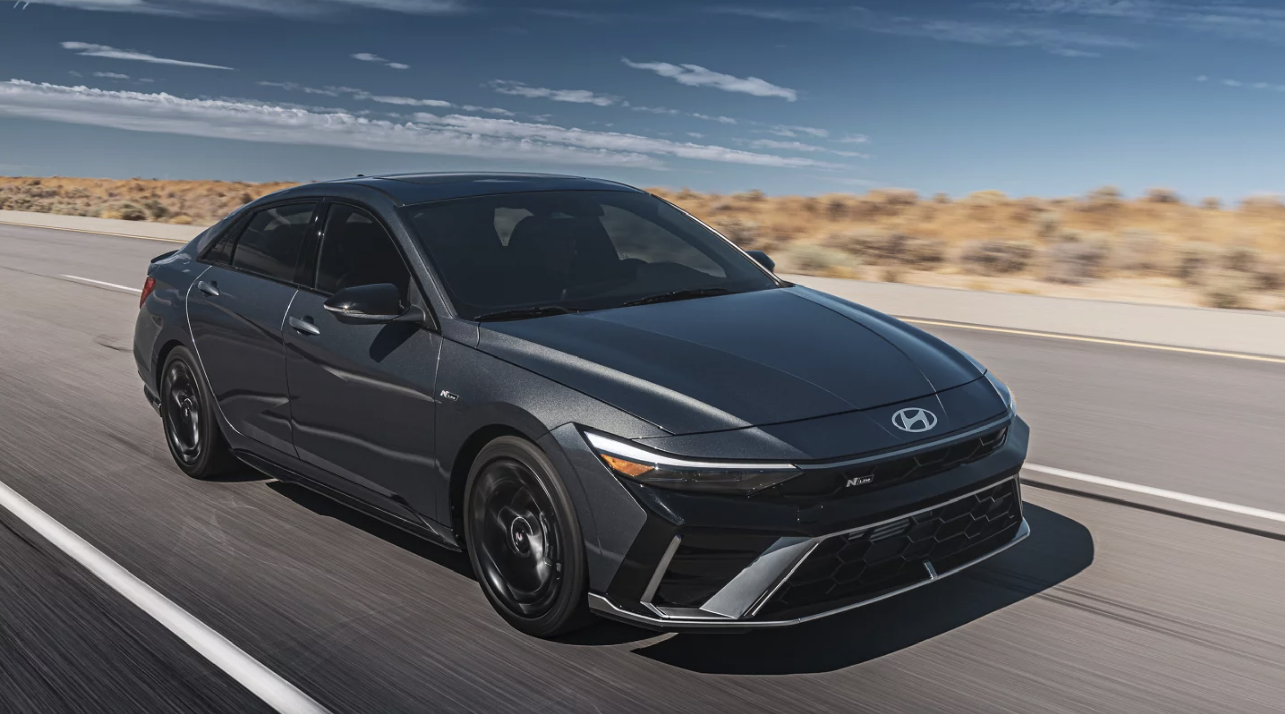 Hyundai Elantra driving on desert road